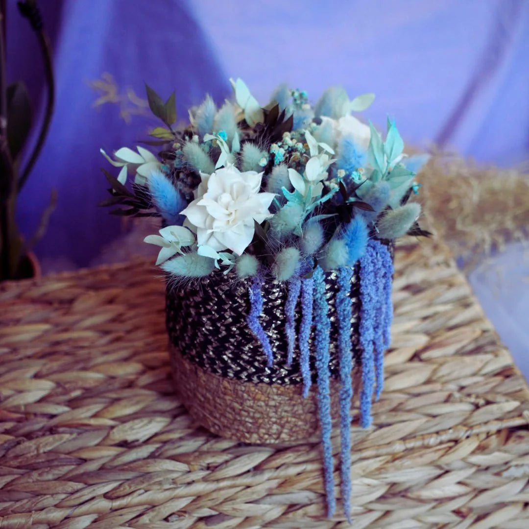 Blue and white dried-flower wedding table arrangement